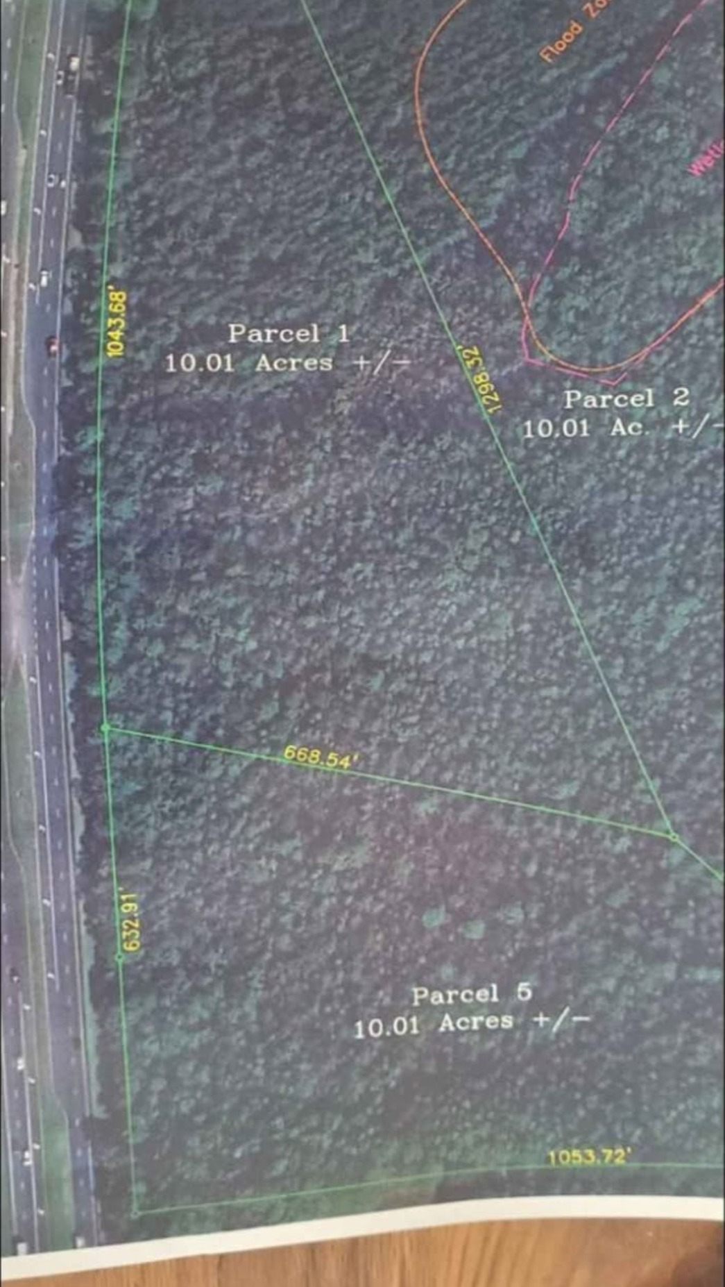 Aerial exhibit of the wooded 10.01-acre tract along US 301 with survey lines